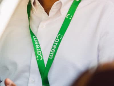 Man wearing customised lanyard