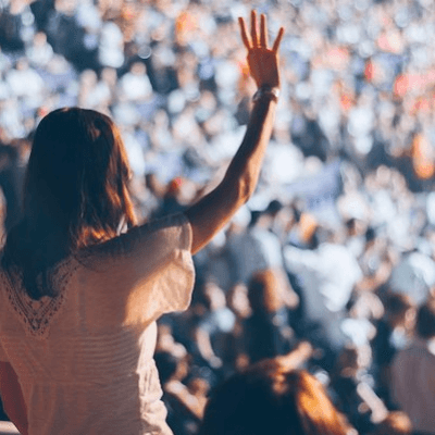 Music festival with woman wearing wristband